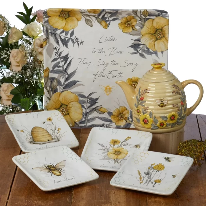 "Bee Sweet" is a charming ceramic dinnerware and serveware collection from Certified International. Designed by Susan Winget, it features busy bees and flowers along with sweet sentiments and a unique 3-d beehive teapot.